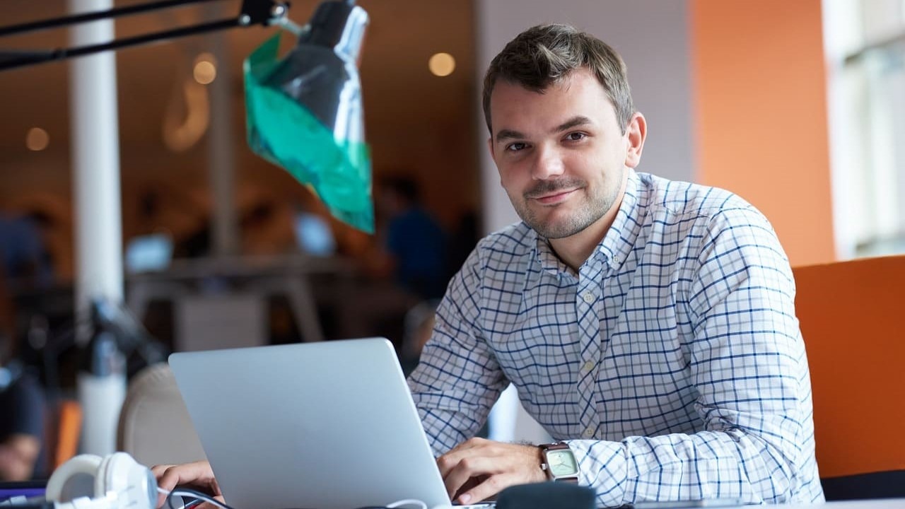 About Man that is working on his laptop
